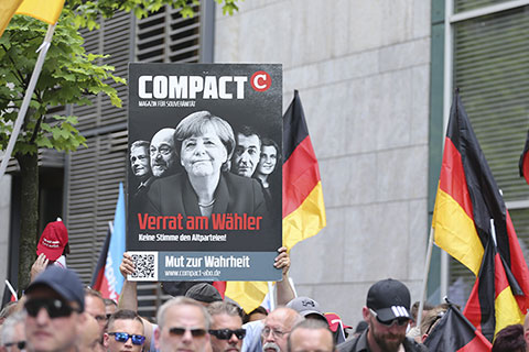 Мигранты портят репутацию Меркель